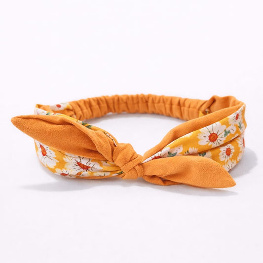 Banda elástica con nudo de tela y delicado estampado floral