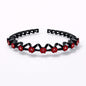 Diadema ondulada con dientes