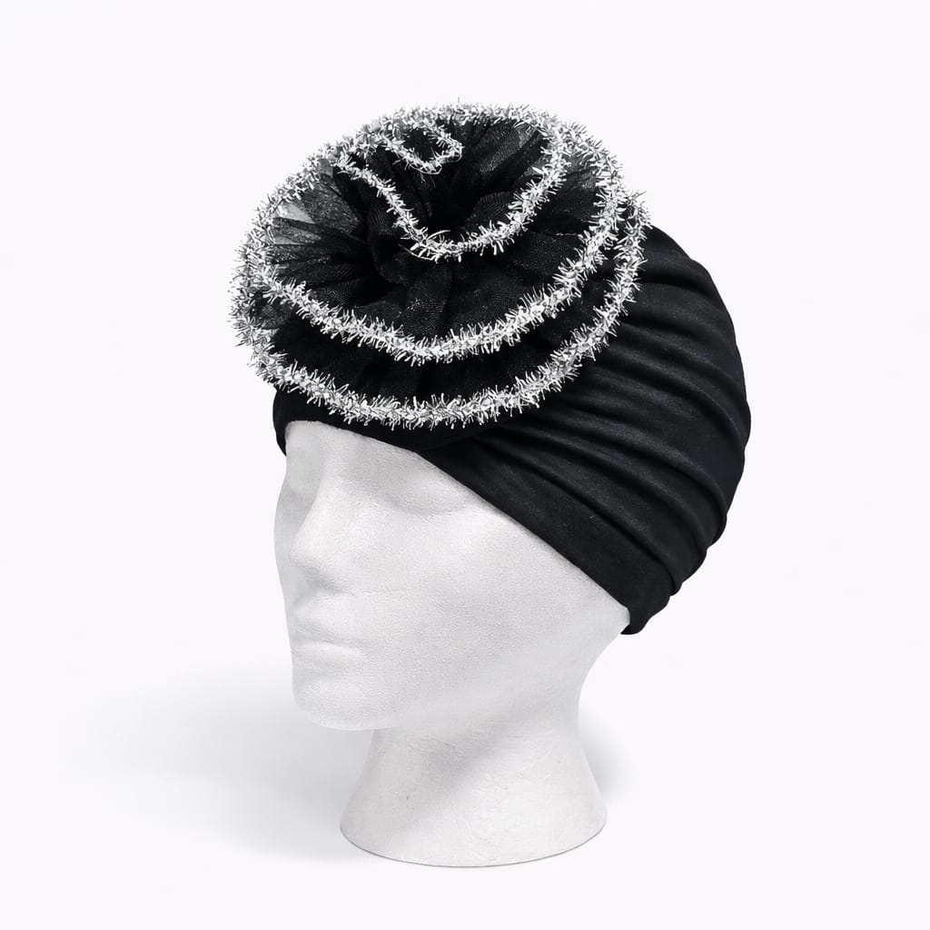 Turbante elegante con flor