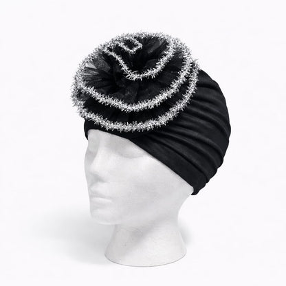 Turbante elegante con flor