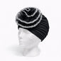 Turbante elegante con flor