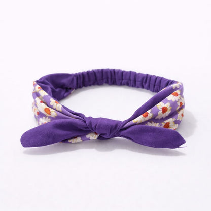 Banda elástica con nudo de tela y delicado estampado floral
