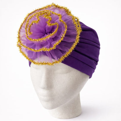 Turbante elegante con flor