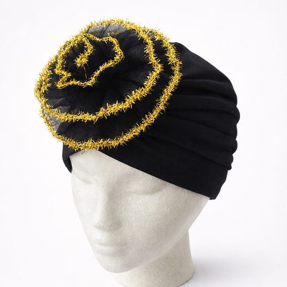 Turbante elegante con flor