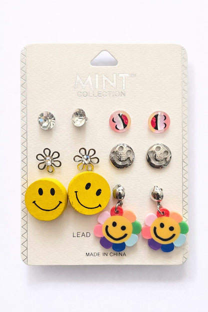 Conjunto de aretes con caras sonrientes