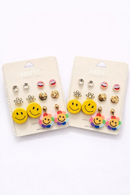 Conjunto de aretes con caras sonrientes