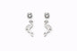 Juego de aretes de flamenco y de botón con circonitas en acero inoxidable. 