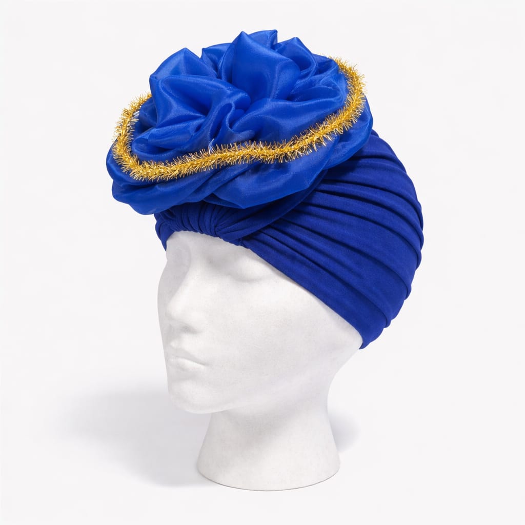 Turbante elegante con flor superior